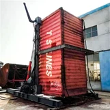 Qual é a capacidade de carga de um basculante de contêineres de pequeno porte?